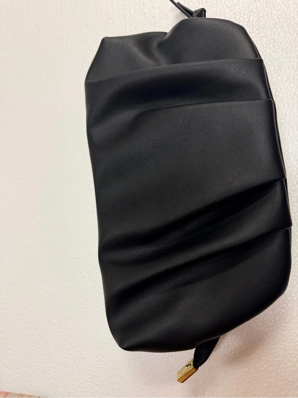 Sleek Black Fold-Detail Wristlet Clutch with Gold Zip